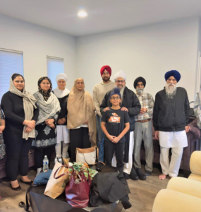 Akal Academy Alumni standing across continents united by values, seva, and purpose