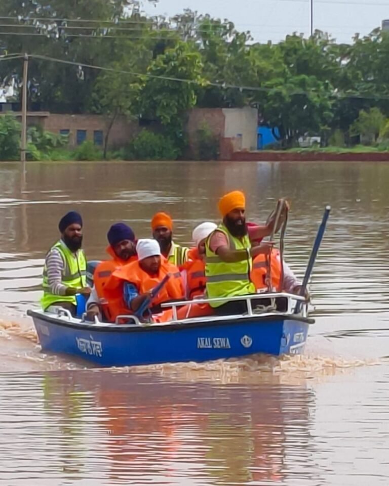 Akal Relief team on boat